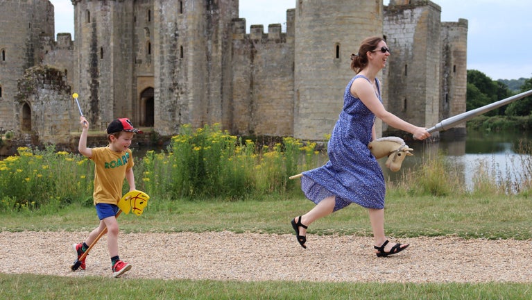 Families enjoying Summer of Play activities at Bodiam Castle